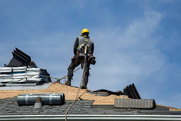 Professional Roof Replacement technician working in Warren, NH